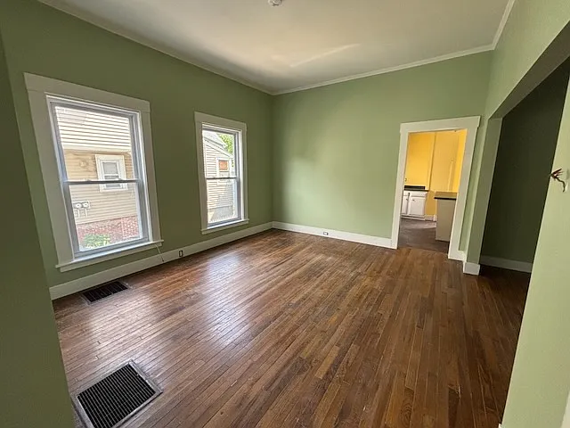 Living room looking into kitchen