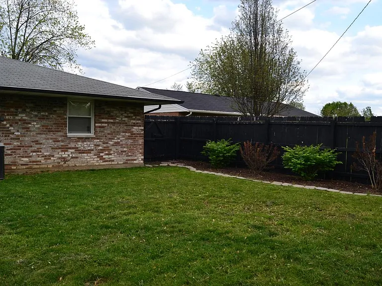 6ft privacy fence w/ opening large enough to fit a truck thr