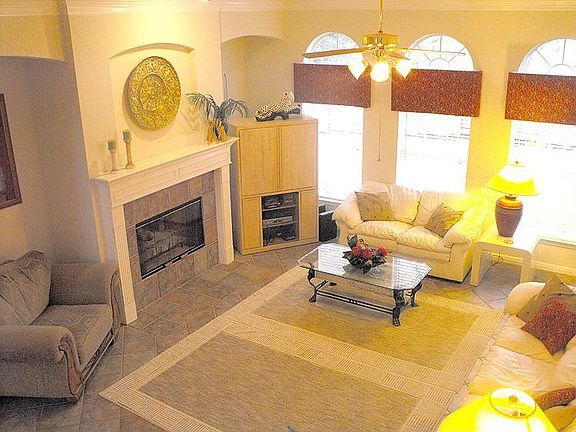 Beautiful Family Room with Fireplace, Alcoves & Art Niche