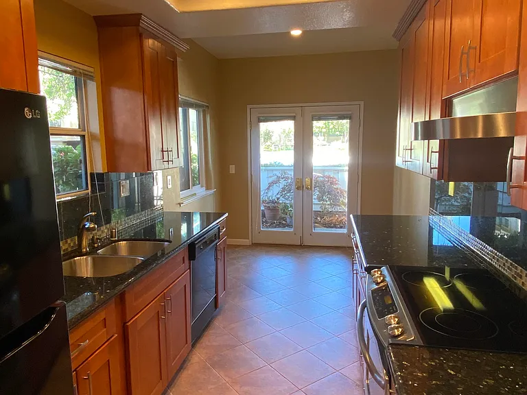 Kitchen nook that opens to outside patio.