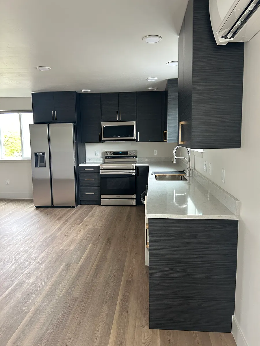 Kitchen view_lots of cabinets, lovely appliances, etc. - 1546 S 5th St W #301