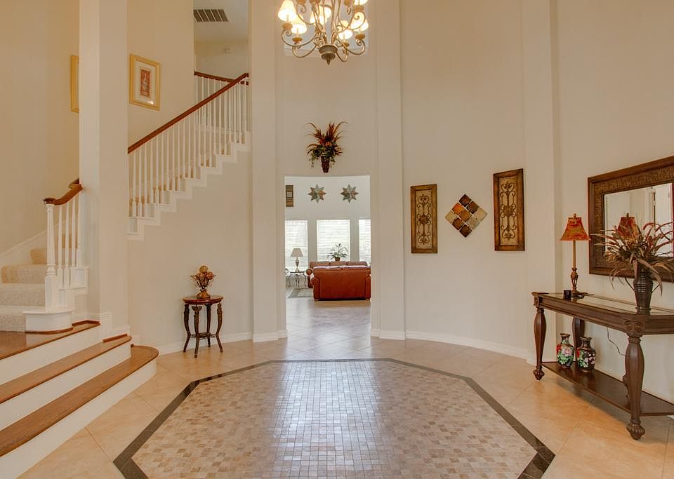    Grand foyer with high ceilings.