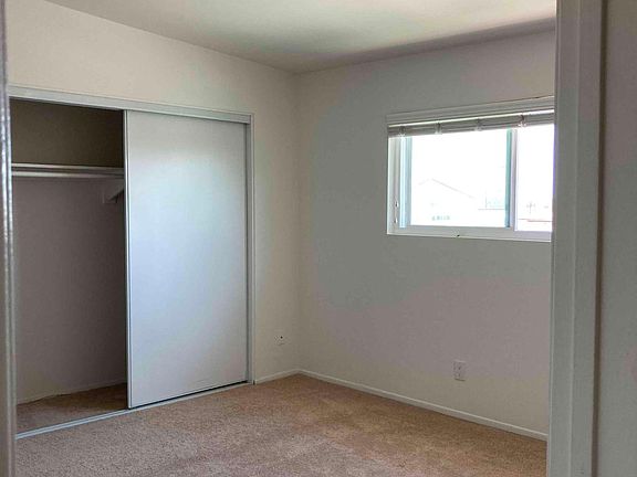 The full-size closet w/slider doors for easy access.