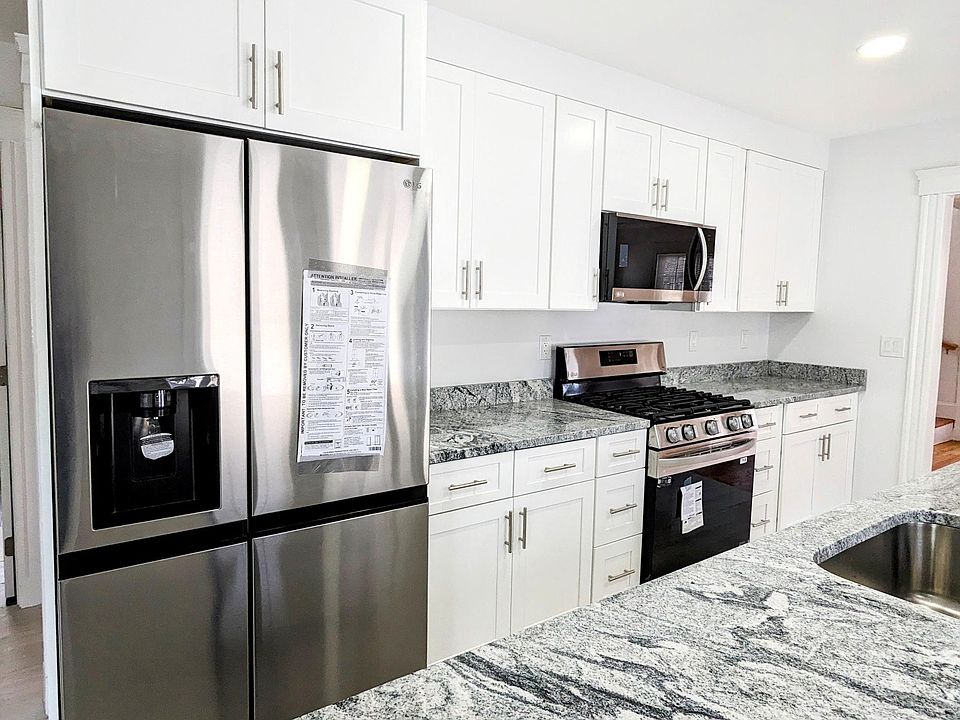 New Fridge with water and ice dispenser, New stove and lots of cabinet space. Even more cabinets in the island with dishwasher.