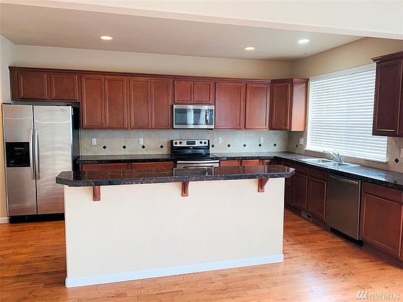 3rd image of 9120 Thea Rose Dr SE