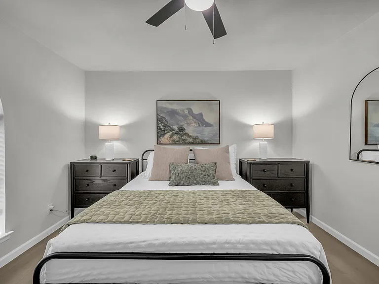 Comfy queen bed with extra sheets, blankets and pillows
