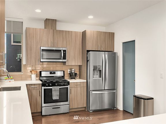 Kitchen with 1/2 bath to the right