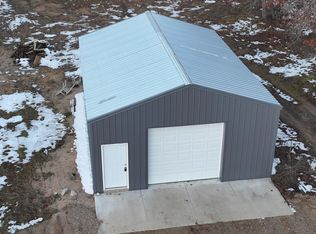 7378 W 10 1/2 Mile Rd, Irons, MI 49644