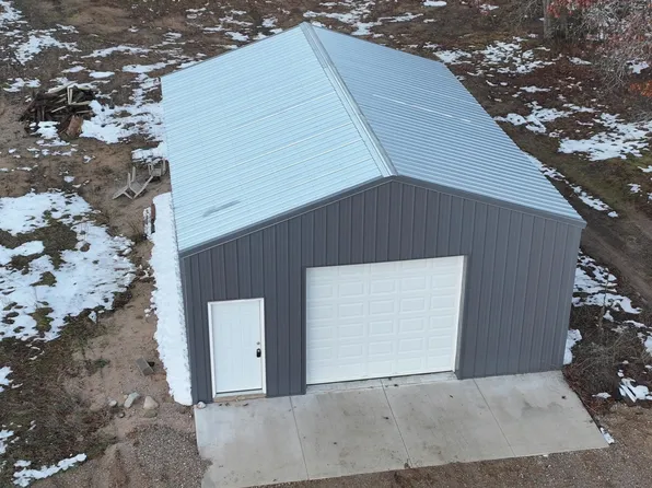 7378 W 10 1/2 Mile Rd, Irons, MI 49644