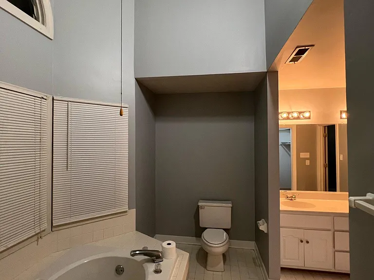 Master bathroom looking out of the shower.