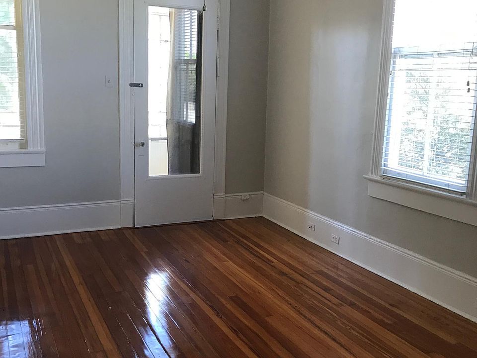 Bedroom 1 with door to screened porch