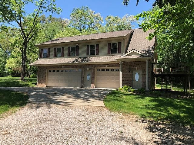 exterior picture with showing deck on right of house