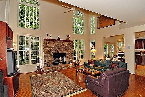 2 Story Family Room w/ Stone Woodburning FP