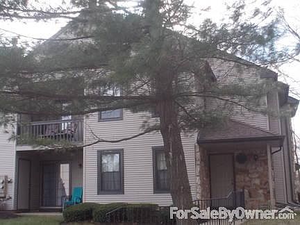 EXTERIOR
						:
						Top Unit with Private Entrance. Sunny, Wooded Location