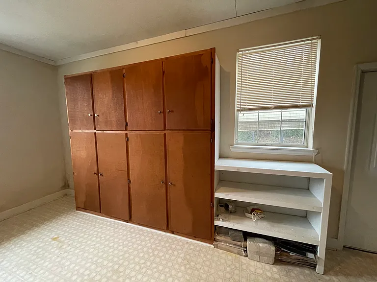 Bonus Room (w/ shelves, storage space, and extra refrigerator)