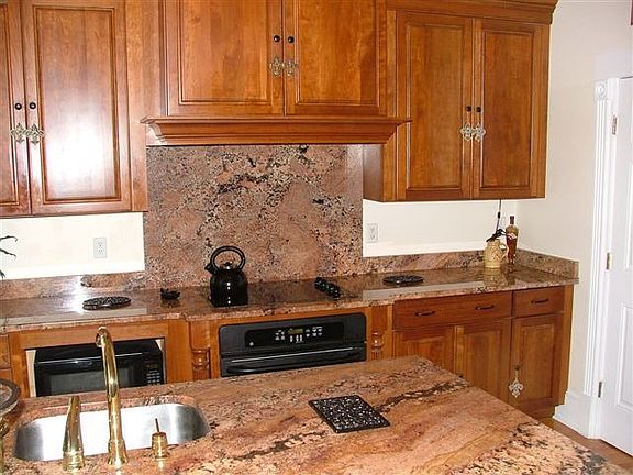 Cherry cabinets, granite counters