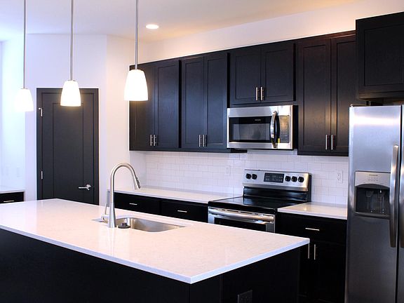 15 feet of Quartz countertops. New stainless steel appliances.