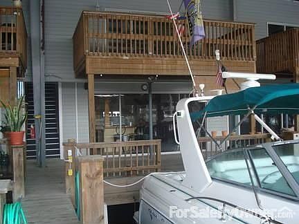 Rear Boat Slip
						:
						Includes Covered Boat Slip, First floor deck space, and Second floor balcony.