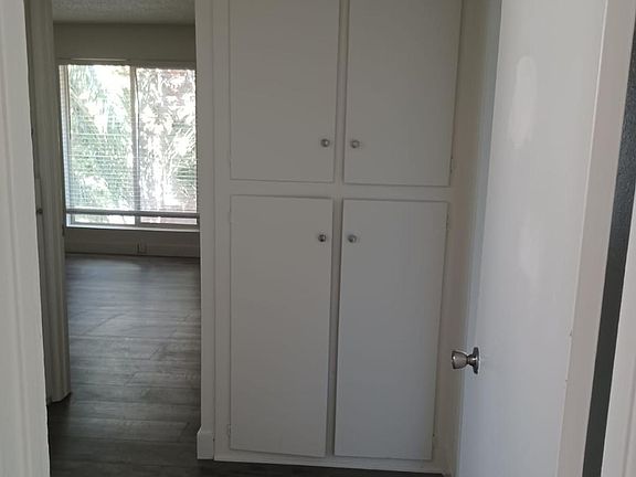 Second bedroom entry way, lots of natural light, linen closet in all leads to bathroom. All completely remodeled.