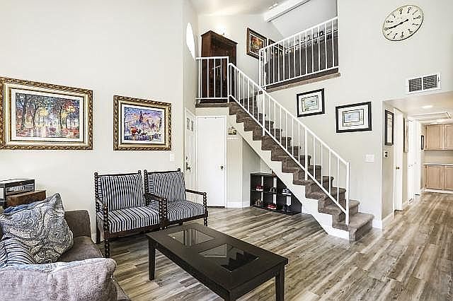 Living Room + Stairs to Loft