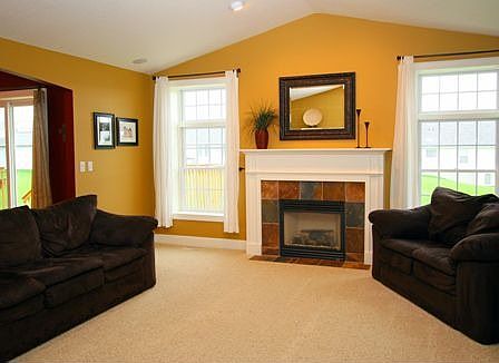 Great room with vaulted ceiling and surround sound
