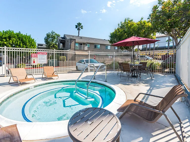 The Outdoor Community Hot Tub/Spa at Meadow Creek Apartments in San Marcos, CA