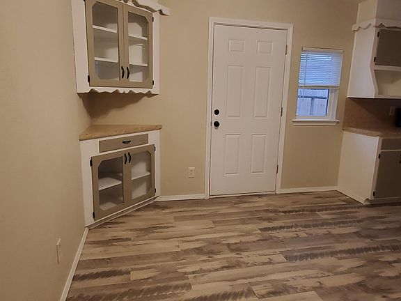 eat-in dining room with door to back yard