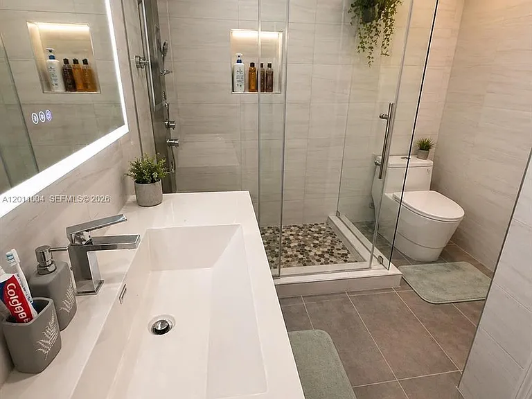 10290 SW 24th Ct — Photo 38