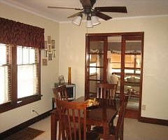 Dining room is bright and leads into a beautiful sun room!