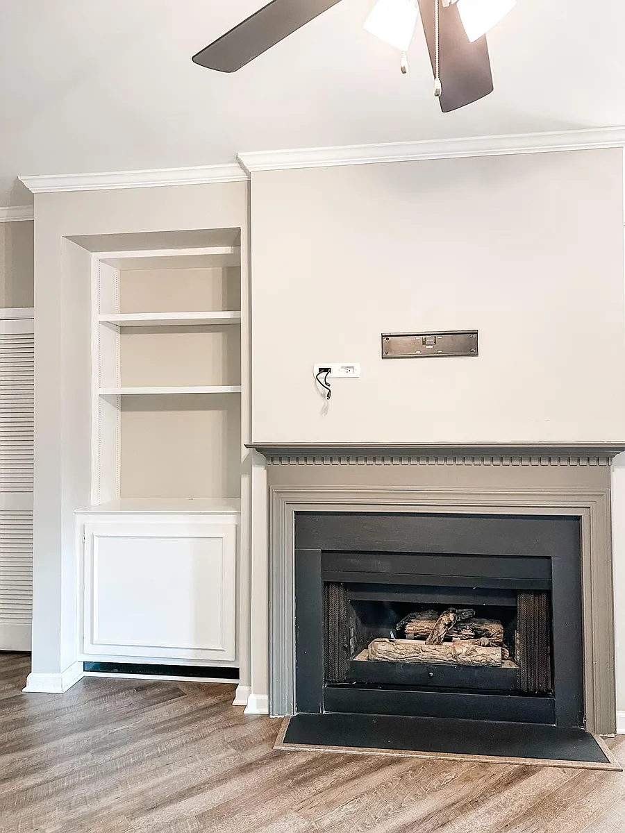 built in shelving, gas fireplace, and prepped to hang a tv - 46580 Drysdale Ter #102