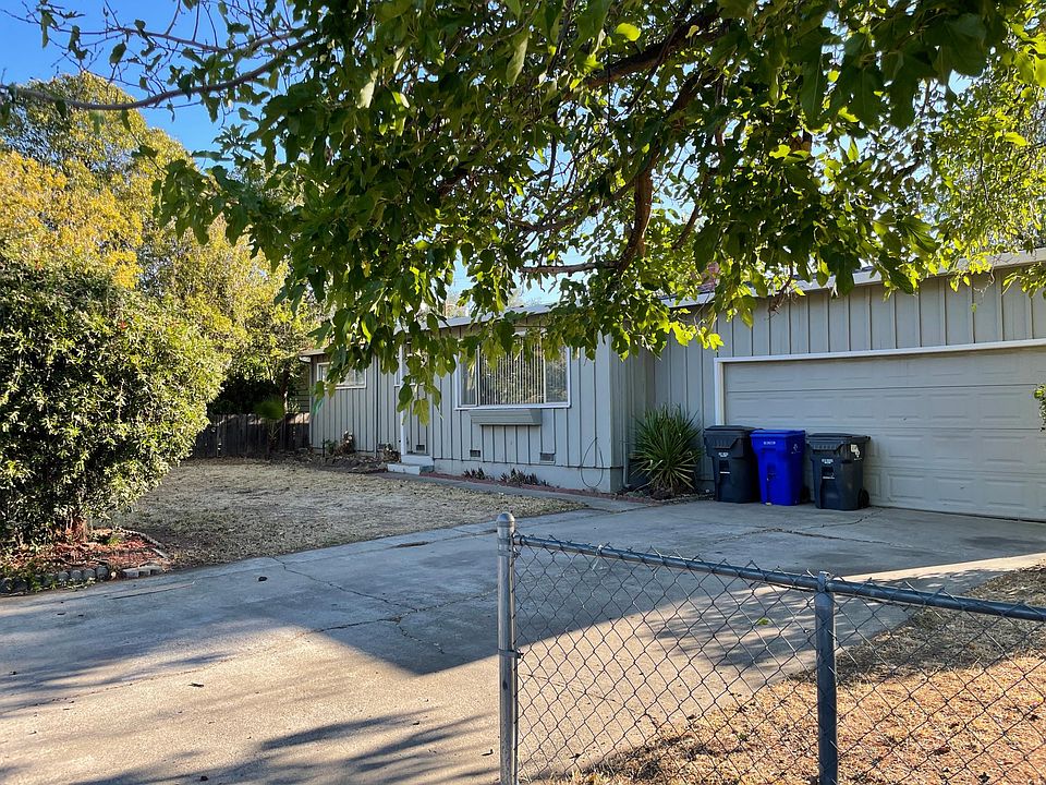 Shade trees and two car Garage