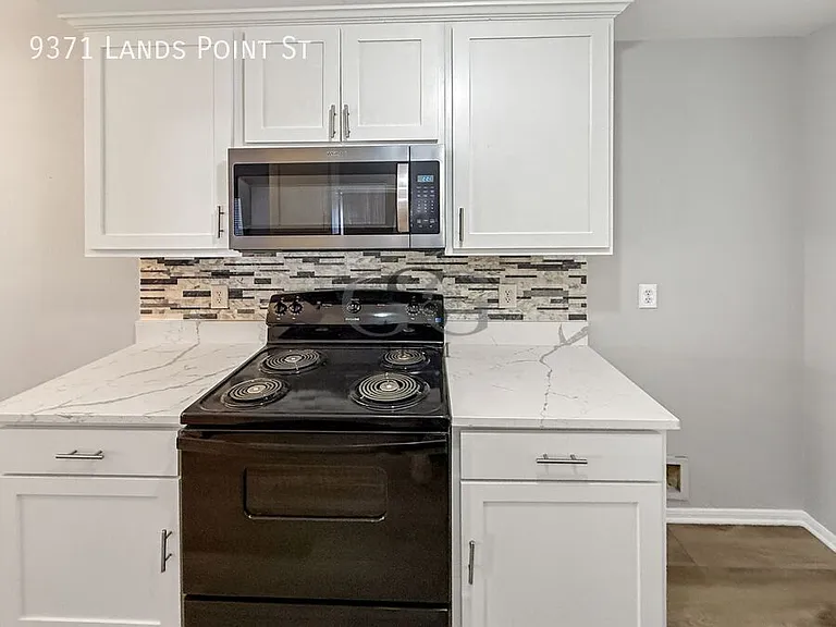 9371 Lands Point St — Photo 32