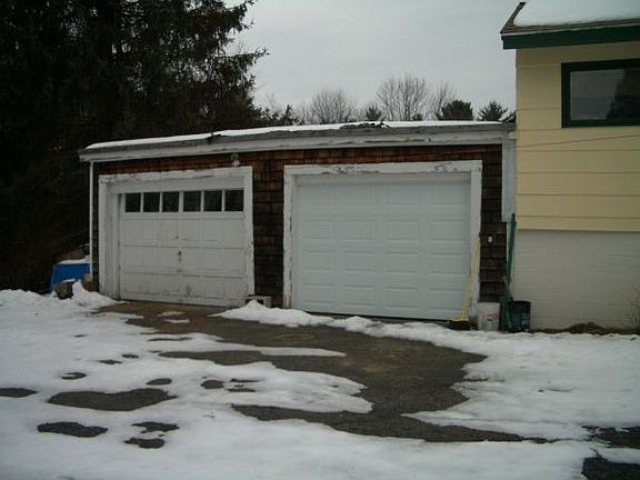 2 Car garage with 1 new door