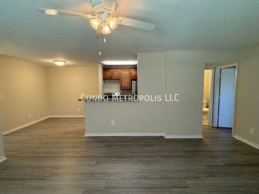 Ground-Floor 1BR Condo in Gated Community Prime MetroWest Location! — Photo 2