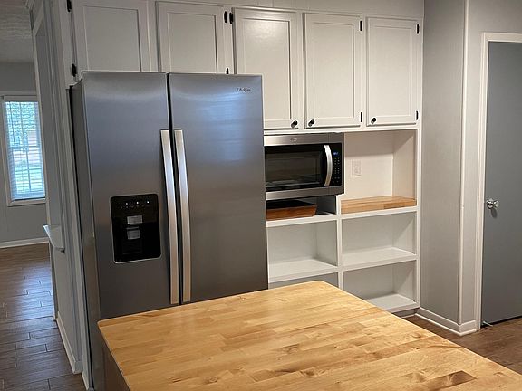 Large Refrigerator included, built in Microwave and Coffee Station