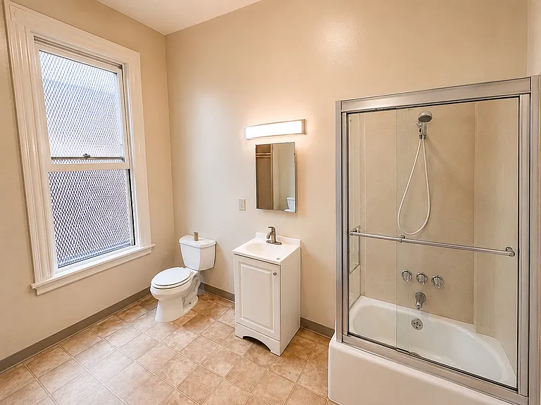 IMAGE EDITED WITH AI TO SHOW SHOWER DOOR. WE'RE AWAITING INSTALL.