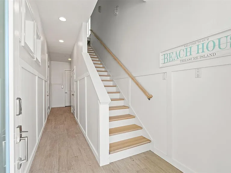 Lower Level Hall, Garage Entry Left, Elevator Back