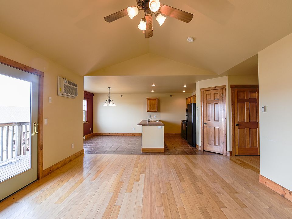 Living room into dining and kitchen