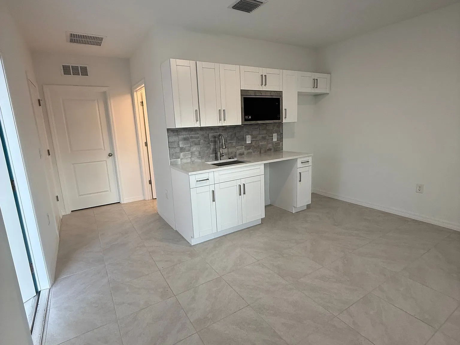 2 ANNEX — Photo 2
