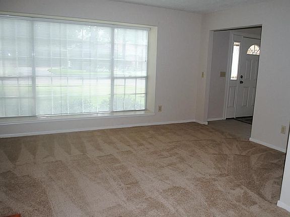 As you enter, the formal living room is right up front.  Big windows allow for lots of natural light!