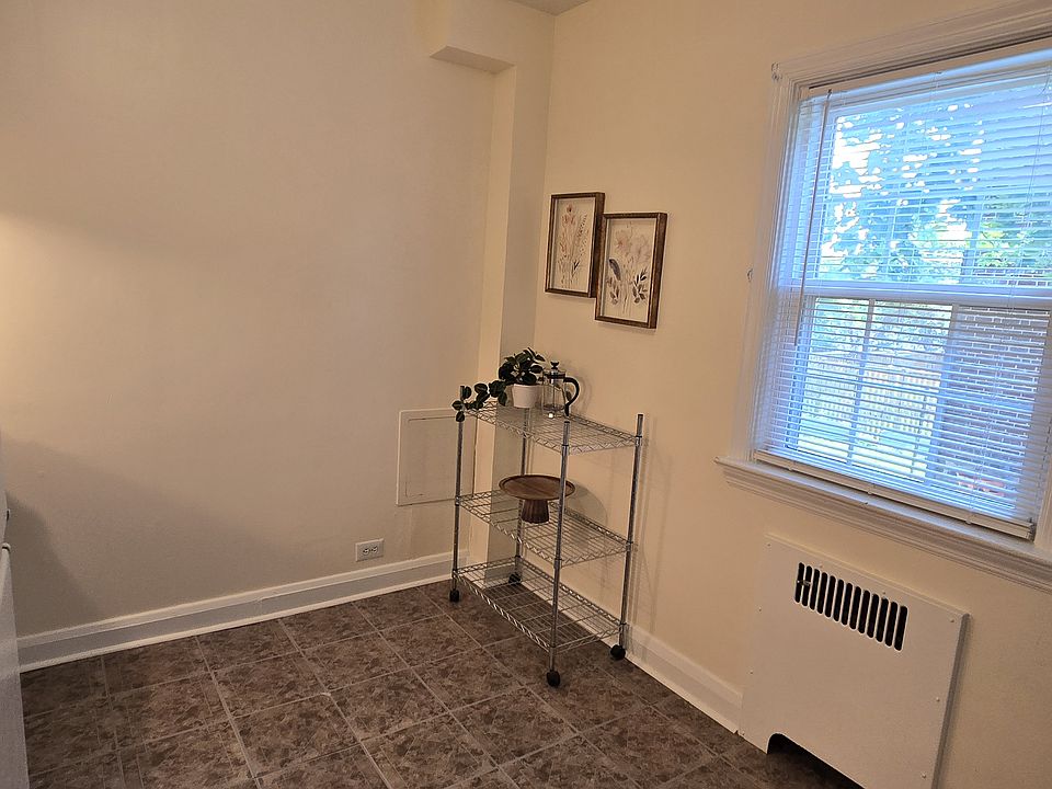 Plenty of wall space to place a small table and chairs or a moveable island.