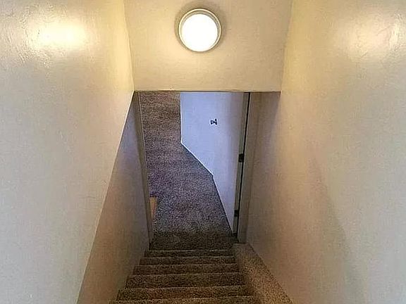 Stairs to basement unit.