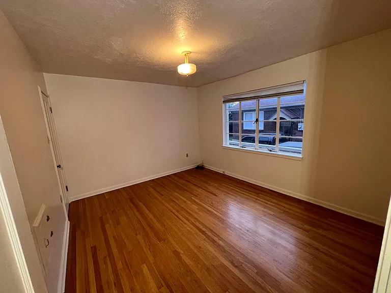 Main floor bedroom with lots of natural light.