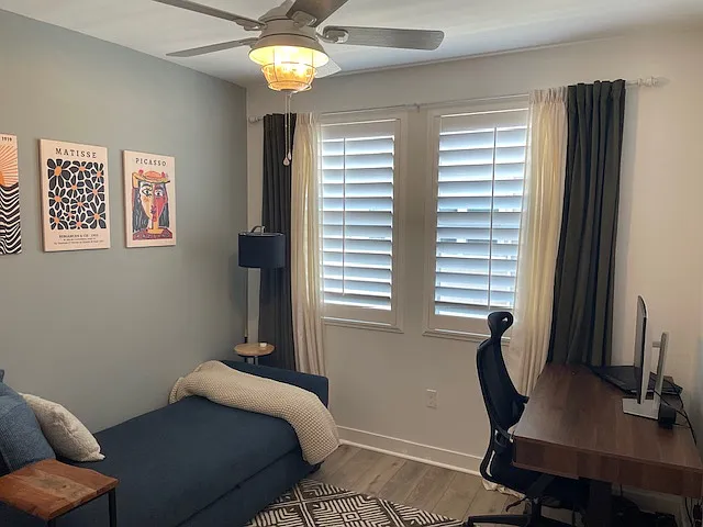 Upstairs bedroom with walk-in closet and ensuite bathroom.