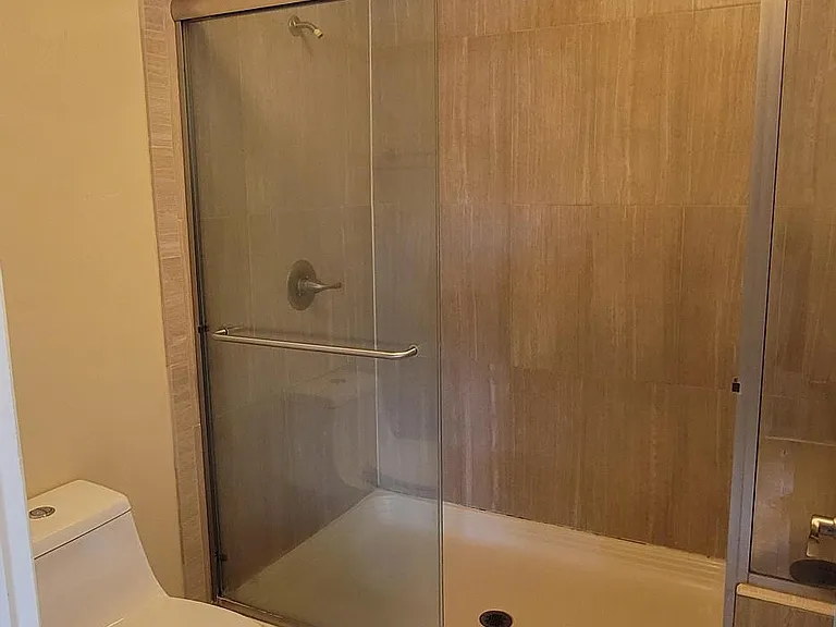 Master bathroom with a walk-in shower.