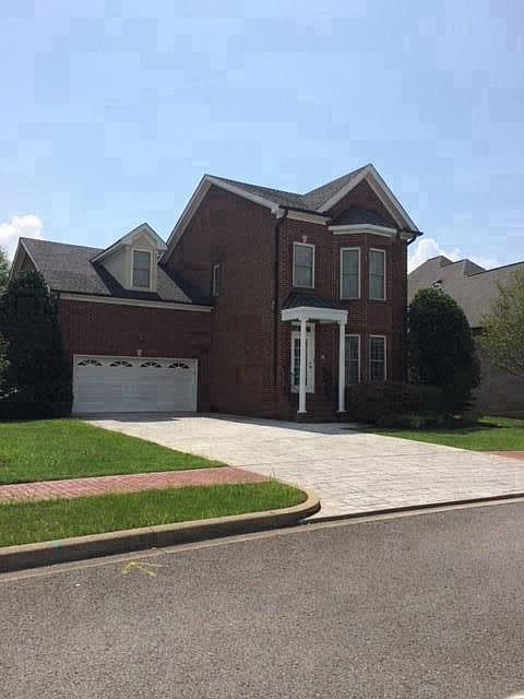 Home is all brick and offers a two car attached garage!