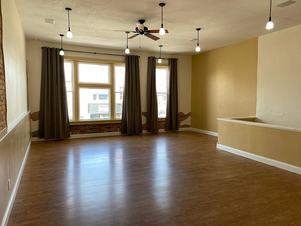 Living room overlooking Main St and Courthouse.