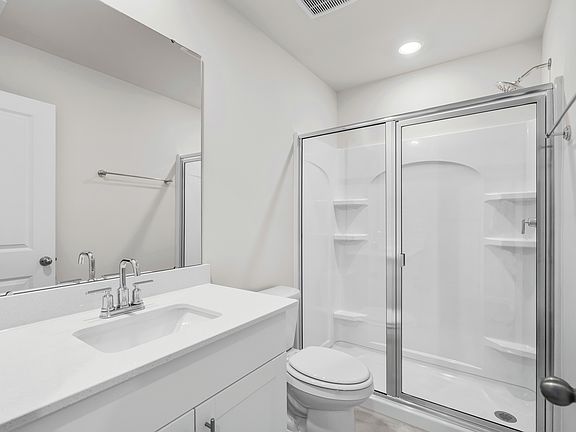 A full bathroom is located upstairs next to the bedroom.