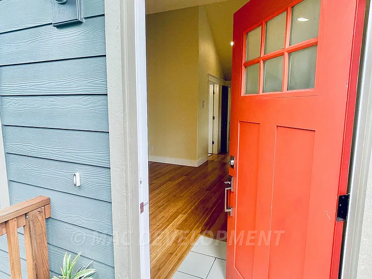 Unit B entrance at the top of the stairs.