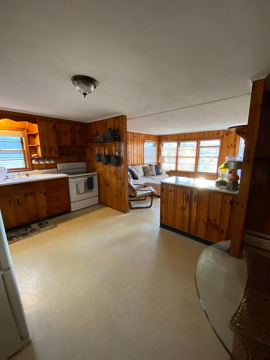 Eat-in kitchen foreground, living room in back - 44 Prospect St